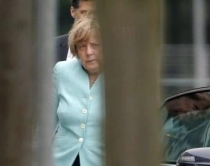Foto lajm/ Merkeli në 'krizë' si<br />Greqia... që pa gdhirë në punë