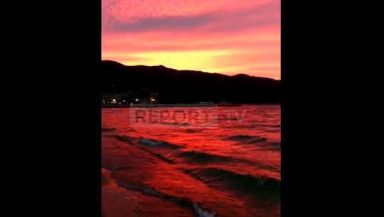 VIDEOLAJM/ Qielli dhe uji i liqenit 'ngjyrosen' me të kuqe, perëndimi i magjishëm në Pogradec