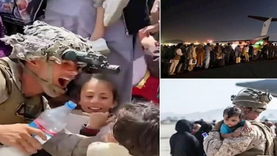 Momente prekëse! Marinsat amerikanë mbajnë në krahë dhe u japin ujë fëmijëve afganë