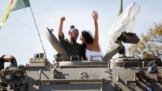Në mes të luftës, çifti izraelit shkon me tank në ceremoninë e dasmës që u shty nga sulmi i Hamasit