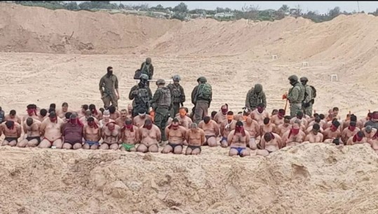 FOTO/ Të ulur në gjunjë dhe me duar të lidhura, ushtria izraelite publikon pamje të militantëve të Hamasit në Rripin e Gazës