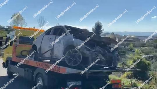 VIDEOLAJM/ U përdor nga autorët gjatë atentatit mafioz në Rinas, makina e djegur në Krujë merret me karrotrec nga zona e pyllëzuar