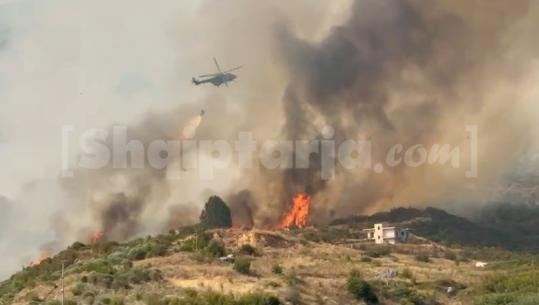 Zjarr në Kostar të Finiqit, flakët futen në fshat dhe rrezikojnë banesat! Ndërhyjnë dy helikopterë (VIDEO)