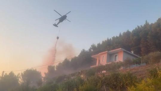 Zjarri në Milot rrezikon banesat, 20 forca të ushtrisë dhe 2 helikopterë në luftë me flakët