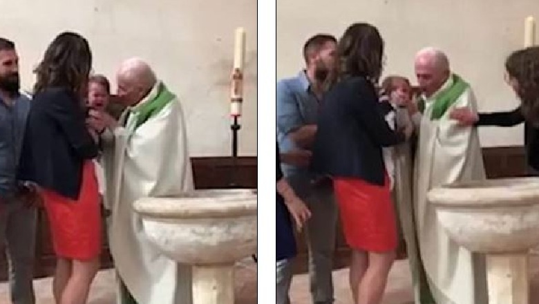 VIDEO/Momenti tronditës, prifti godet me shuplakë fëmijën që qante gjatë pagëzimit