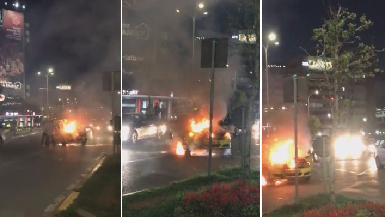 Tiranë/ U përplas me një makinë tjetër, merr flakë taksia tek 'Zogu i Zi' (VIDEO)