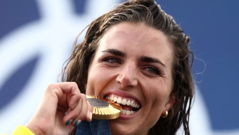 Pse olimpistët kafshojnë medaljet e arta?
