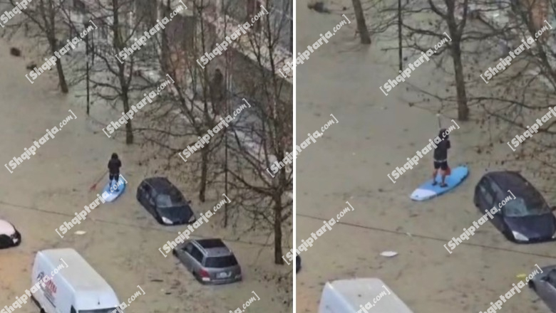 Mbi dërrasë sërfi e lopatë në duar, qytetari lundron në rrugët e Durrësit (VIDEO)