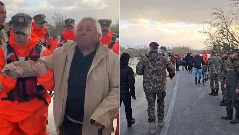 Fier/ Ushtarët mbajnë në krah të moshuarin për ta evakuuar, niveli i ujit arrin kufirin maksimal të argjinaturës në Ferras