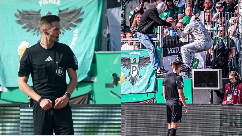 Incident i pazakontë në Gjermani, tifozi i maskuar futet në fushë dhe i heq prizën VAR-it gjatë ndeshjes