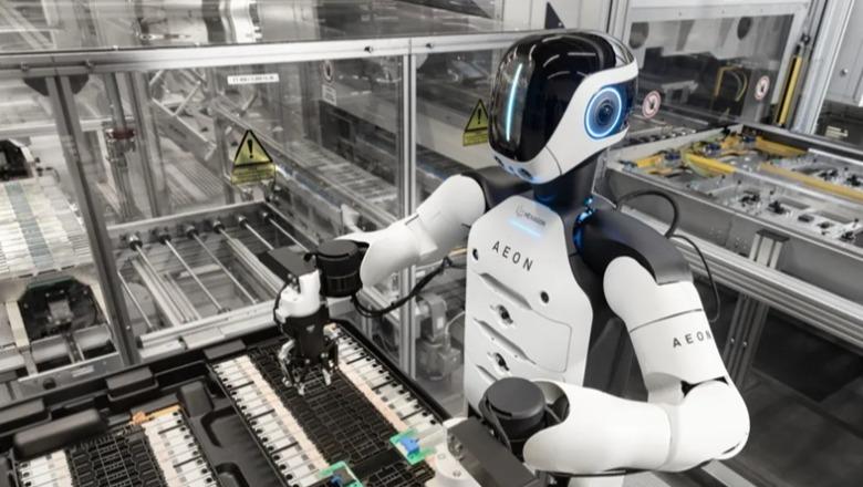 Robotë që imitojnë veprimet duke i parë  montojnë bateri e pjesë makinash    BMW  punëson  humanoidët