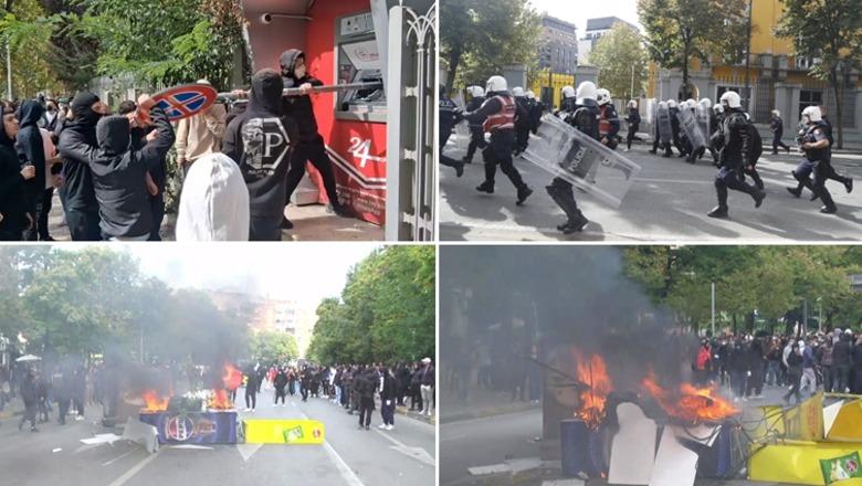 LIVE TV- Protestuesit sulm bizneseve, ndezin zjarr në mes të Tiranës! Sulm me gurë Kuvendit, 3 ministrive dhe efektivëve, Policia i spraps direkt me gaz lotsjellës! Shkatërrojnë kangjella e semaforë